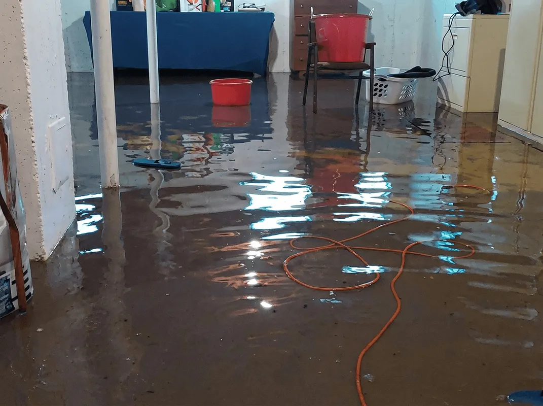 Basement with boiler, cabinets and washing machine completely flooded in San Antonio, TX